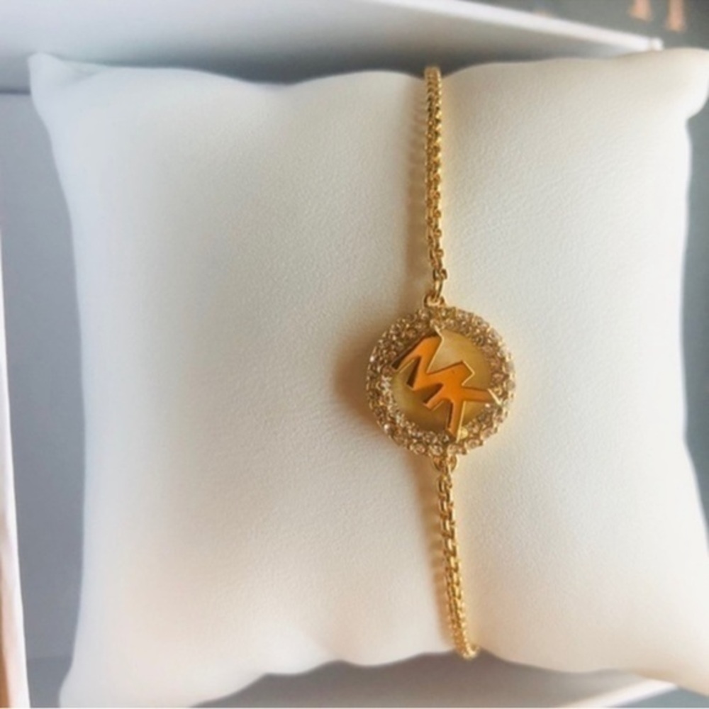 Michael Kors Gold Logo Bracelet Pavé Crystal Circle Charm Adjustable NWT